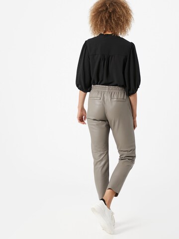 OAKWOOD Slim fit Trousers 'Gift' in Beige