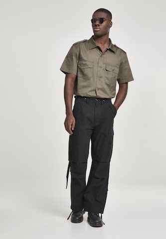 Brandit Loose fit Cargo Pants in Black: front