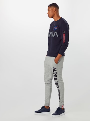ALPHA INDUSTRIES - Sudadera 'Nasa' en azul