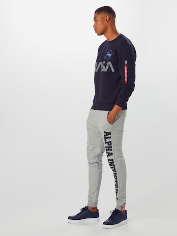 ALPHA INDUSTRIES Bluzka sportowa 'Nasa' w kolorze niebieski