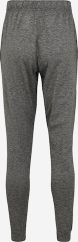 Effilé Pantalon de sport NIKE en gris