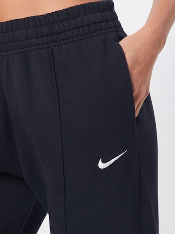 Largi Pantaloni de la Nike Sportswear pe negru