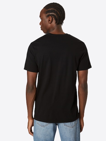 T-Shirt LEVI'S ® en noir : derrière