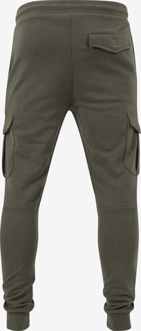 Tapered Pantaloni cu buzunare de la Urban Classics pe verde