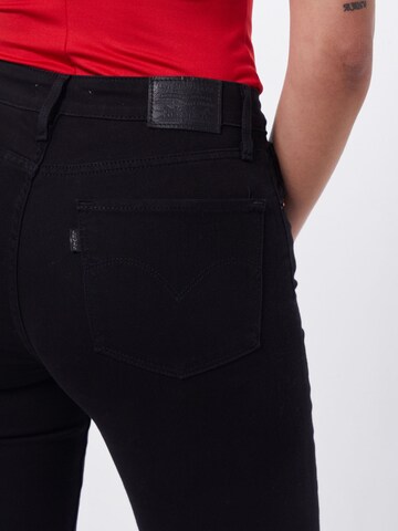 juoda LEVI'S ® Platėjantis Džinsai '725 High Rise Bootcut'