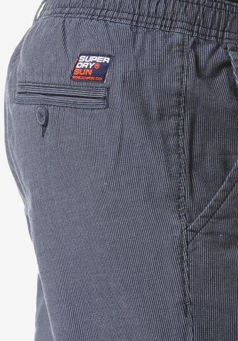 Regular Pantalon chino Superdry en bleu