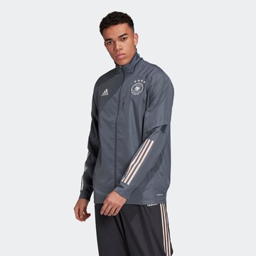 ADIDAS SPORTSWEAR - Casaco de treino em cinzento: frente