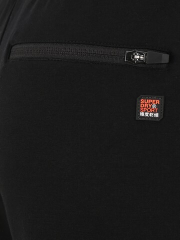 Superdry Ozke Športne hlače | črna barva