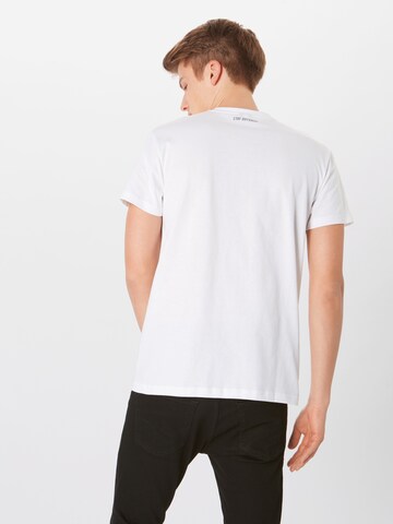 T-Shirt 'Flutscher' Iriedaily en blanc : derrière