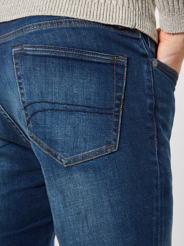 Slimfit Jeans 'Tyler' de la Superdry pe albastru