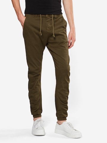 Urban Classics Tapered Nadrág - zöld: elől