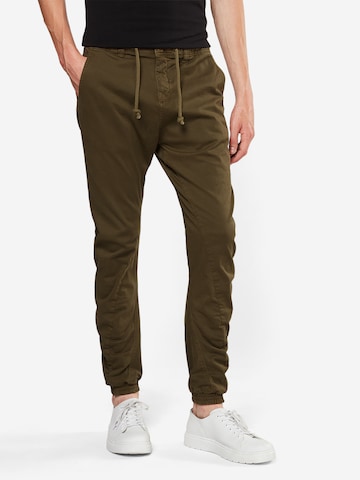 Tapered Pantaloni di Urban Classics in verde: frontale