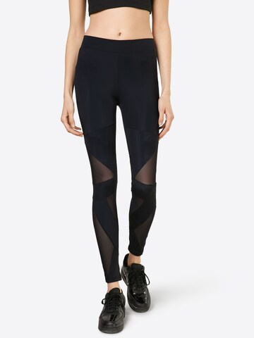 Urban Classics Skinny Leggings in Black: front
