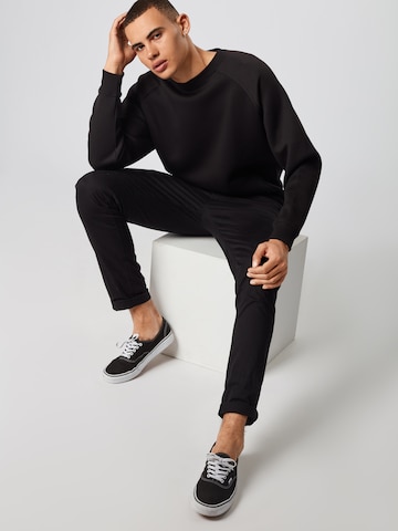 Urban Classics Sweatshirt in Black