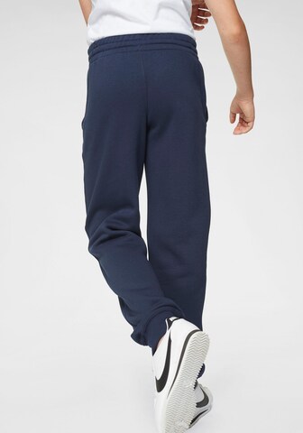 Nike Sportswear Tapered Broek in Blauw