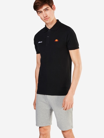 Tricou 'MONTURA' de la ELLESSE pe negru: față