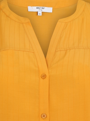 Camicia da donna 'Doro' di ABOUT YOU Curvy in giallo