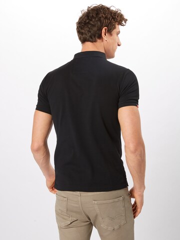 T-Shirt Superdry en noir : derrière