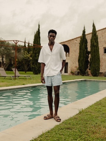 White T-shirt & Light Blue Shorts Look