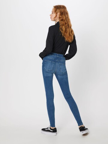 Skinny Jean 'Lux' VERO MODA en bleu : derrière