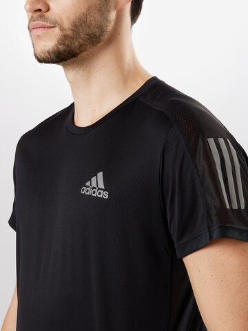 Maglia funzionale 'Own the Run' di ADIDAS SPORTSWEAR in nero