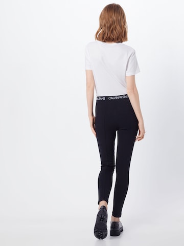 Calvin Klein Jeans Úzky strih Nohavice 'MILANO' - Čierna: zadná strana