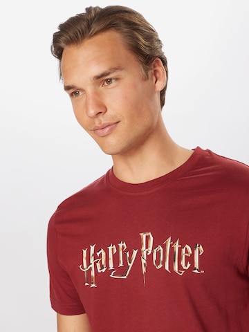 Coupe regular T-Shirt 'Harry Potter' Mister Tee en rouge