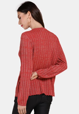 Pullover di faina in rosso