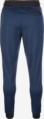 UNDER ARMOUR Tapered Sportbroek in Blauw