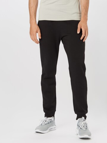 Champion Authentic Athletic Apparel Tapered Pants in Black: front