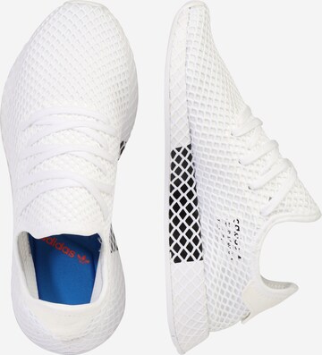 Baskets basses 'Deerupt Runner' ADIDAS ORIGINALS en blanc : sur le côté