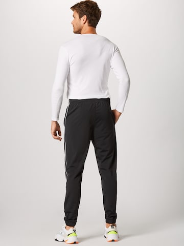 Nike Sportswear Joggingpak in Zwart: terug