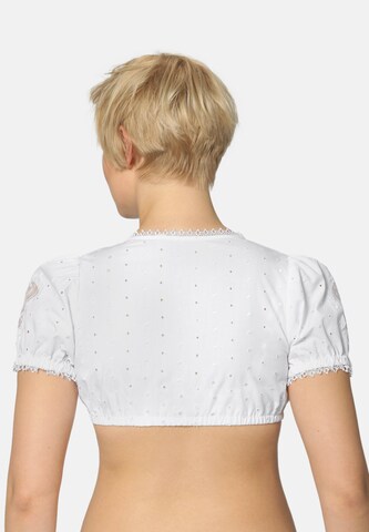 STOCKERPOINT - Blusa tradicional en blanco