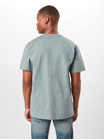 Carhartt WIP Tričko 'Chase' - Modrá: zadná strana