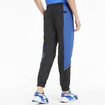 PUMA Tapered Sportbroek in Zwart