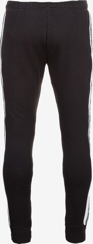 Skinny Pantalon UMBRO en noir