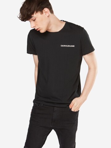 Tricou de la Calvin Klein Jeans pe negru: față