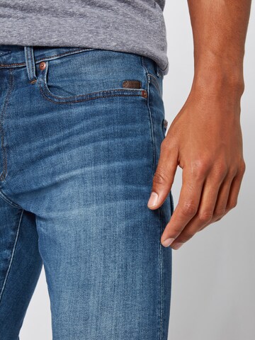 G-STAR Skinny Jeans 'Revend' in Blauw
