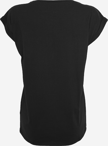 Merchcode Koszulka 'Kiss' w kolorze czarny: tył