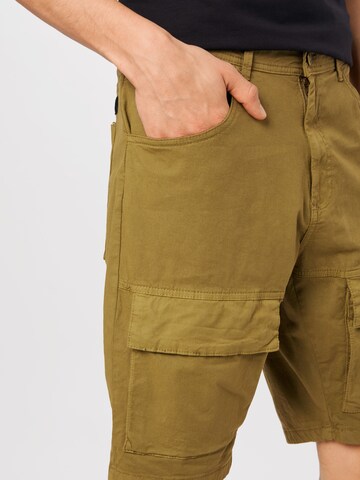 Urban Classics Regular Cargo trousers 'Performance' in Green