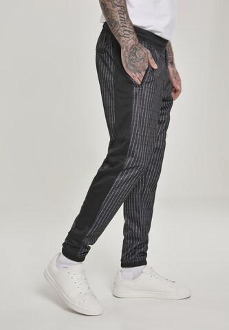 Effilé Pantalon 'Fuck you' Mister Tee en noir : devant