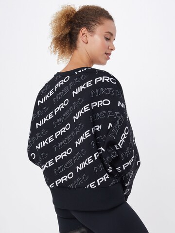 NIKE Sport sweatshirt i svart