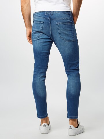 Skinny Jeans de la Urban Classics pe albastru: spate