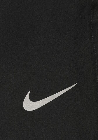 NIKE Regular Sportbroek 'RUN STRIPE' in Zwart