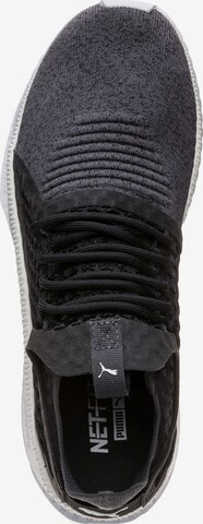 PUMA Sneaker 'TSUGI Netfit v2 evoKNIT' in Schwarz