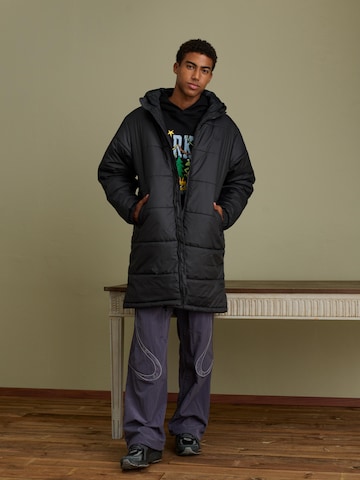 Long Black Puffer Jacket Look