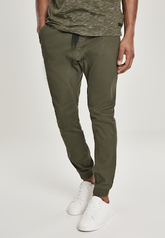 Tapered Pantaloni di SOUTHPOLE in verde: frontale