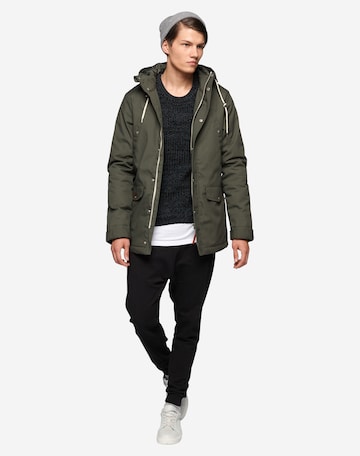 Revolution Between-season jacket in Green