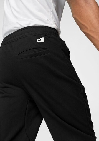 OCEAN SPORTSWEAR Tapered Workout Pants in Black