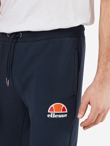 ELLESSE - Tapered Calças de desporto 'Ovest' em azul